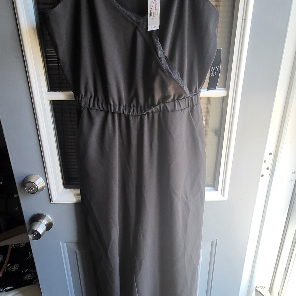 Black jumpsuit never worn  thick straps with lace around neck